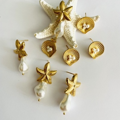 Brincos concha com pérolas e estrela do mar