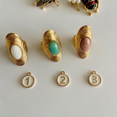 Anéis em aço ajustáveis - dourados #210