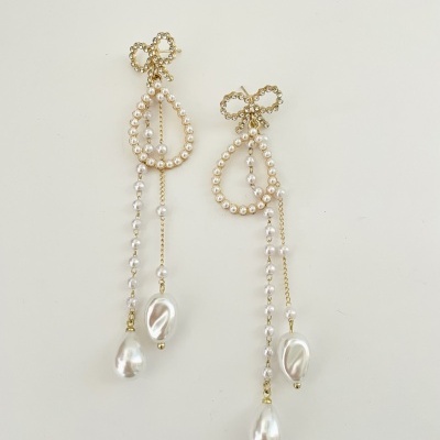 Brincos laços com pérolas e  zircónias