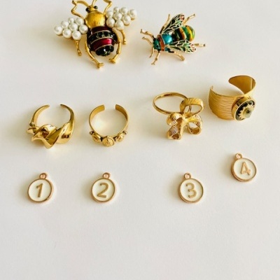 Anéis em aço ajustáveis - dourados #196