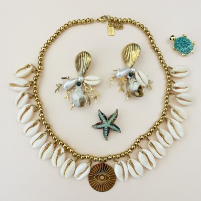 Colar búzios e olho