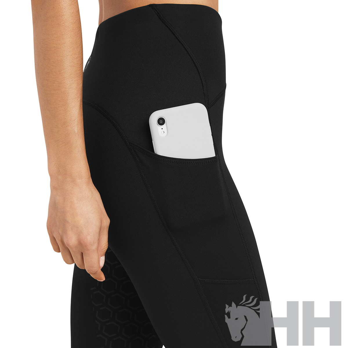 Leggings pretas com bolso lateral e telemóvel branco