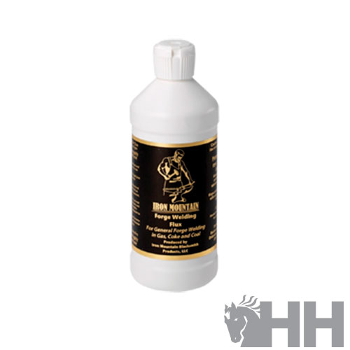 Frasco branco com rótulo preto e dourado de flux de soldagem Iron Mountain