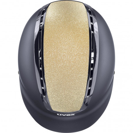 Capacete preto com detalhe dourado brilhante central e marca uvex