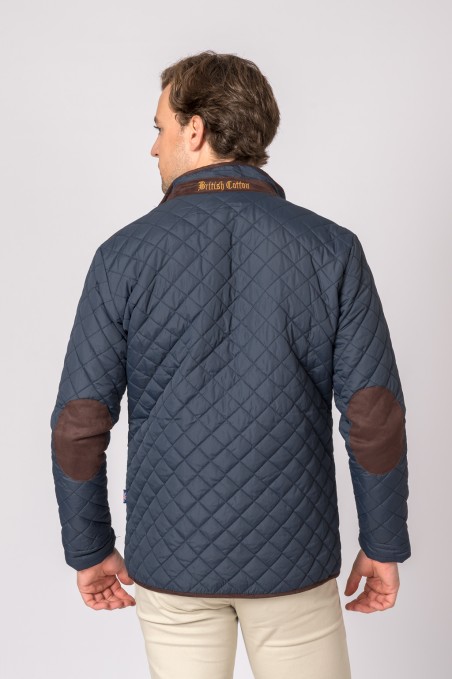 Casaco masculino acolchoado azul escuro com cotoveleiras castanhas visto de costas