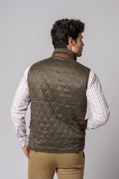 Colete masculino acolchoado verde-oliva com detalhes em couro castanho