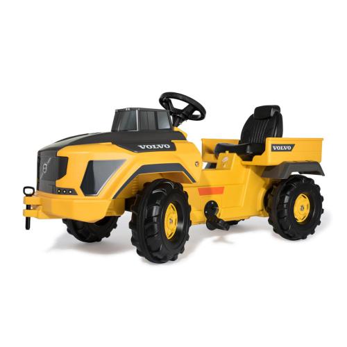 Trator infantil amarelo e preto da marca VOLVO em fundo branco