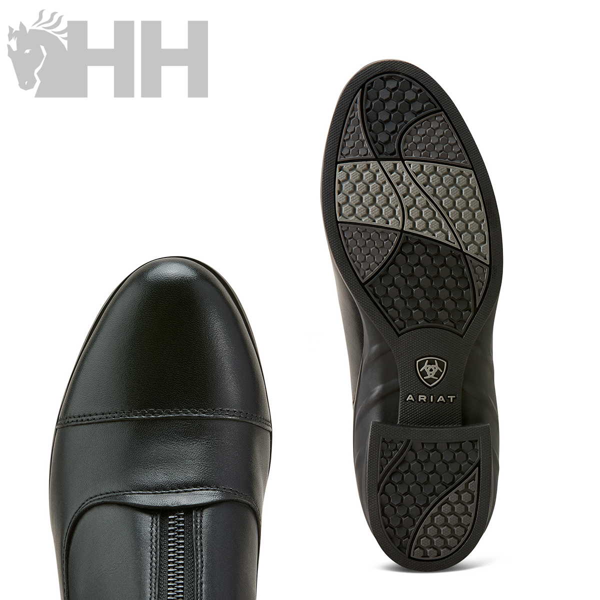 Botas pretas de couro com sola preta e fecho de zip