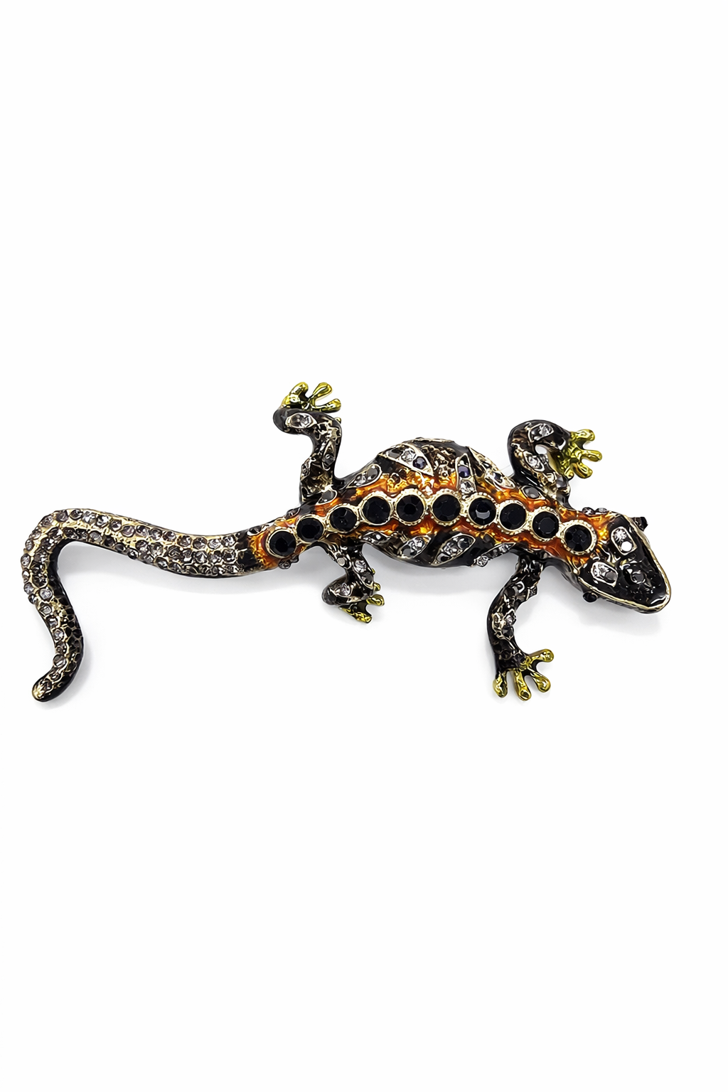 Broche metálico em forma de lagarto com pedras pretas e transparentes