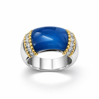 Anel com pedra azul e detalhes dourados e cristais