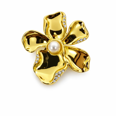 Broche flor dourado com pedras e pérola ao centro