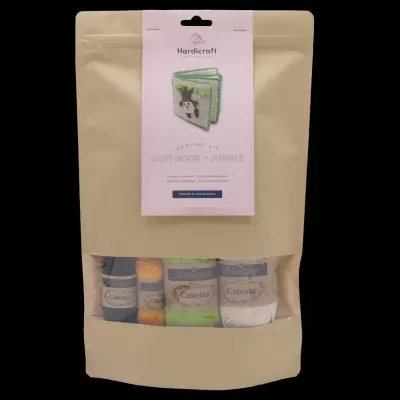 Pacote de papel kraft com novelos de linha coloridos e etiqueta rosa Hardicraft