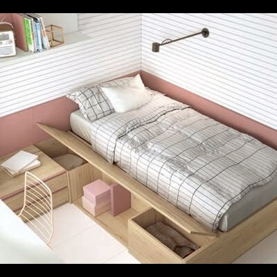 Cama individual com gavetas e roupa de cama branca com padrão de quadrados