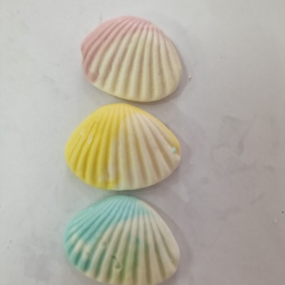 Sabonetes em formato de conchas com cores pastel