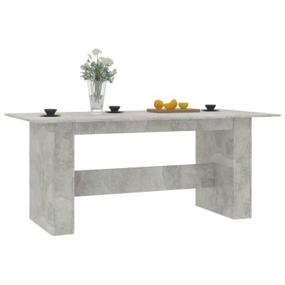 Mesa de jantar cinza com decoração e fundo branco