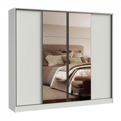 Roupeiro branco com portas deslizantes e espelhos que refletem um quarto decorado.