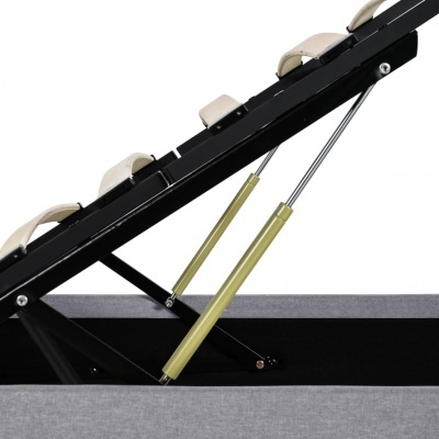 Estrutura de cama ajustável com almofadas bege e braços hidráulicos dourados