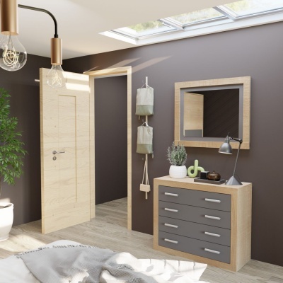 Quarto com móvel de gavetas cinzentas e madeira clara, espelho alpendurado na parede castanha, porta aberta e luminárias pendentes de lâmpadas expostas.