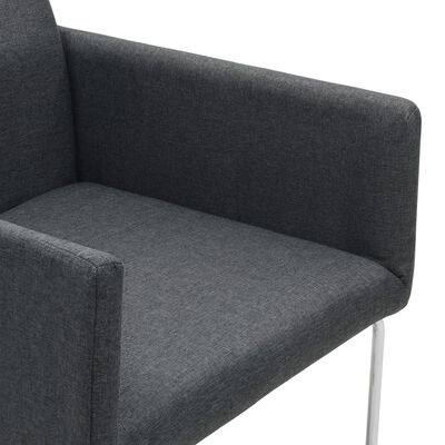 Cadeira estofada cinzenta com braços e pernas metálicas prateadas