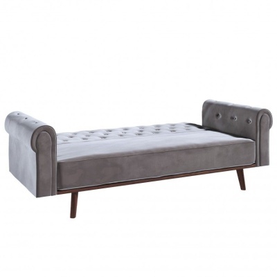 Sofá-cama cinzento em veludo com braços enrolados e pernas de madeira