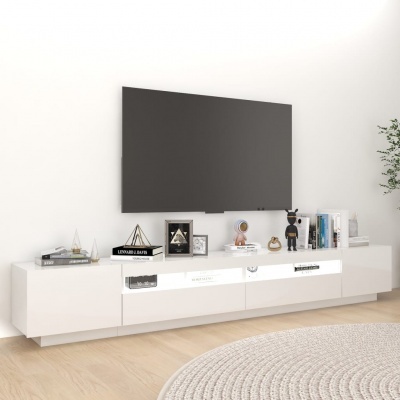 Móvel de televisão branco com decoração e TV de ecrã plano montada na parede