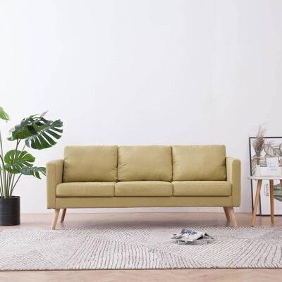 Sofá verde-oliva de três lugares com pernas de madeira em sala minimalista