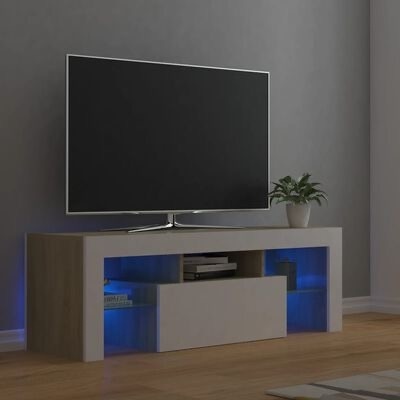 Móvel moderno para televisão com iluminação LED azul e planta em vaso