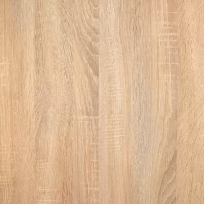 Superfície de madeira clara com textura e veios visíveis