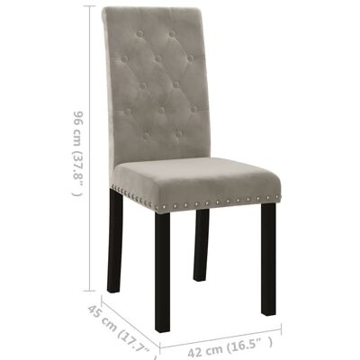 Cadeira estofada cinzenta com pernas pretas e tachas metálicas