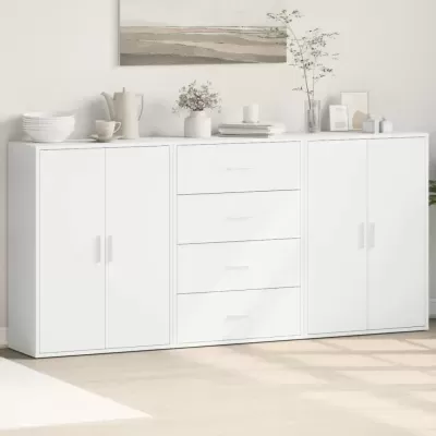 Aparador branco com quatro portas e três gavetas decorado com jarros, livros e quadro na parede