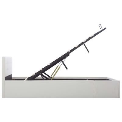 Cama branca com sistema elevatório inclinado e área de arrumação