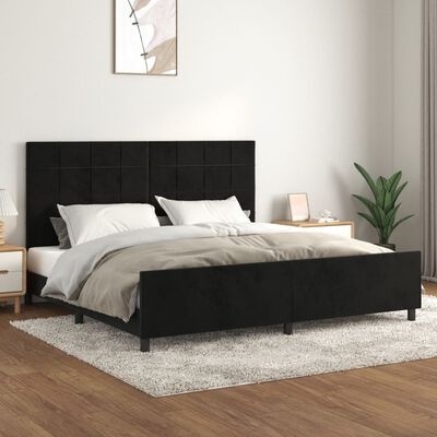 Cama com estofado preto e decoração moderna com tapete cinza