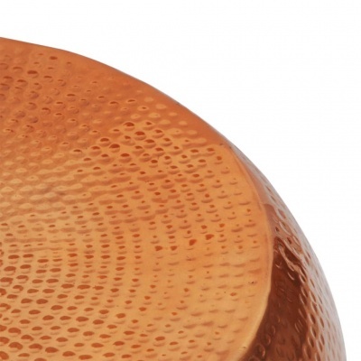 Superfície texturizada em cobre de objeto metálico arredondado