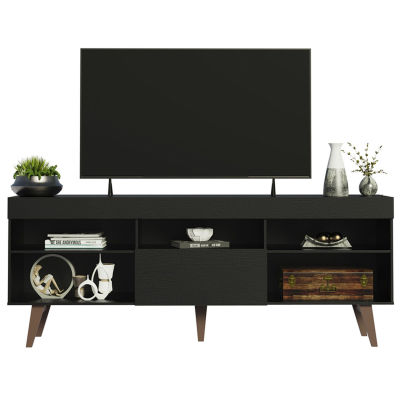 Móvel preto com televisão e decoração variada