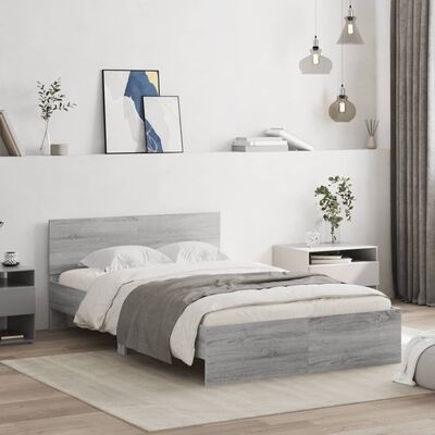 Quarto moderno com cama de casal cinza clara e decoração minimalista