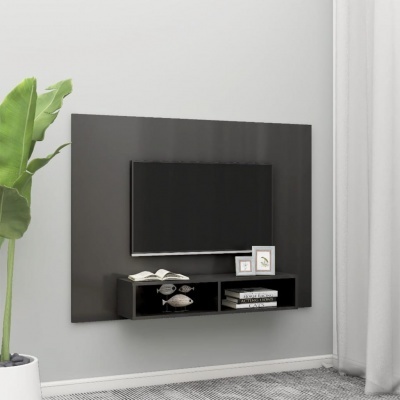 Painel de TV preto com prateleira e decoração numa sala moderna