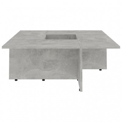 Mesa de centro quadrada cinzenta com textura de cimento e centro cavado