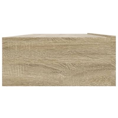 Caixa retangular de madeira clara com textura visível