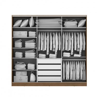 Armário organizado com roupas brancas, almofadas e malas em divisórias de madeira.