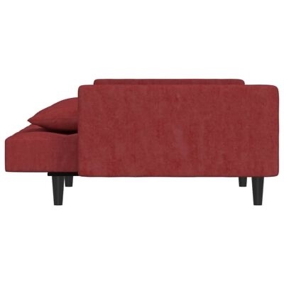 Sofá cama vermelho com pernas pretas visto de lado