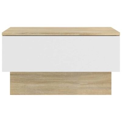 Móvel de arrumação em madeira clara com frentes brancas