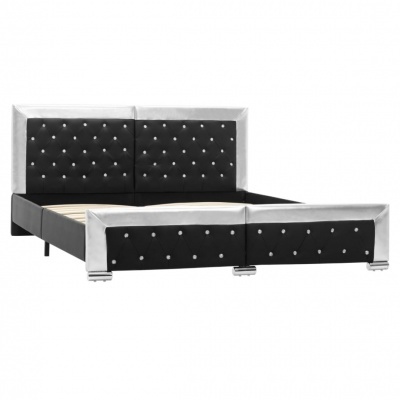 Cama de casal preto com detalhes prateados e botões acolchoados