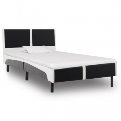 Cama individual estofada em preto e branco com colchão branco
