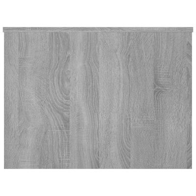 Piso laminado cinza claro com padrão de madeira