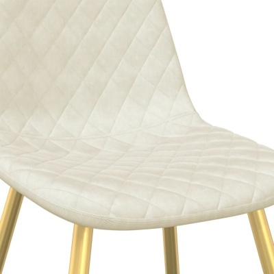 cadeira estofada bege com padrão matelassê e pernas douradas