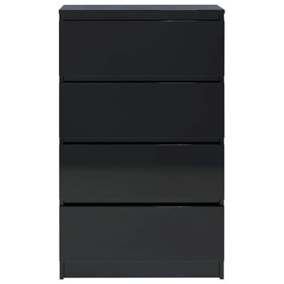 Móvel preto com quatro gavetas e acabamento liso