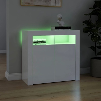 Móvel branco moderno com portas e iluminação LED verde numa divisão com chão de madeira, parede cinza, busto decorativo, livros e planta em vaso cinza