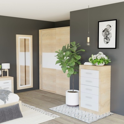 Quarto moderno com móveis em madeira clara e branco e decoração neutra