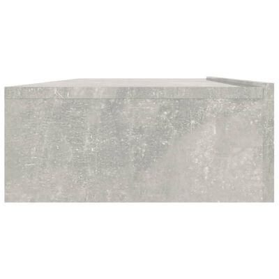 Mesa de centro retangular cinza claro com textura de cimento