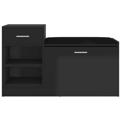 Móvel preto com gaveta, prateleiras abertas e banco acolchoado